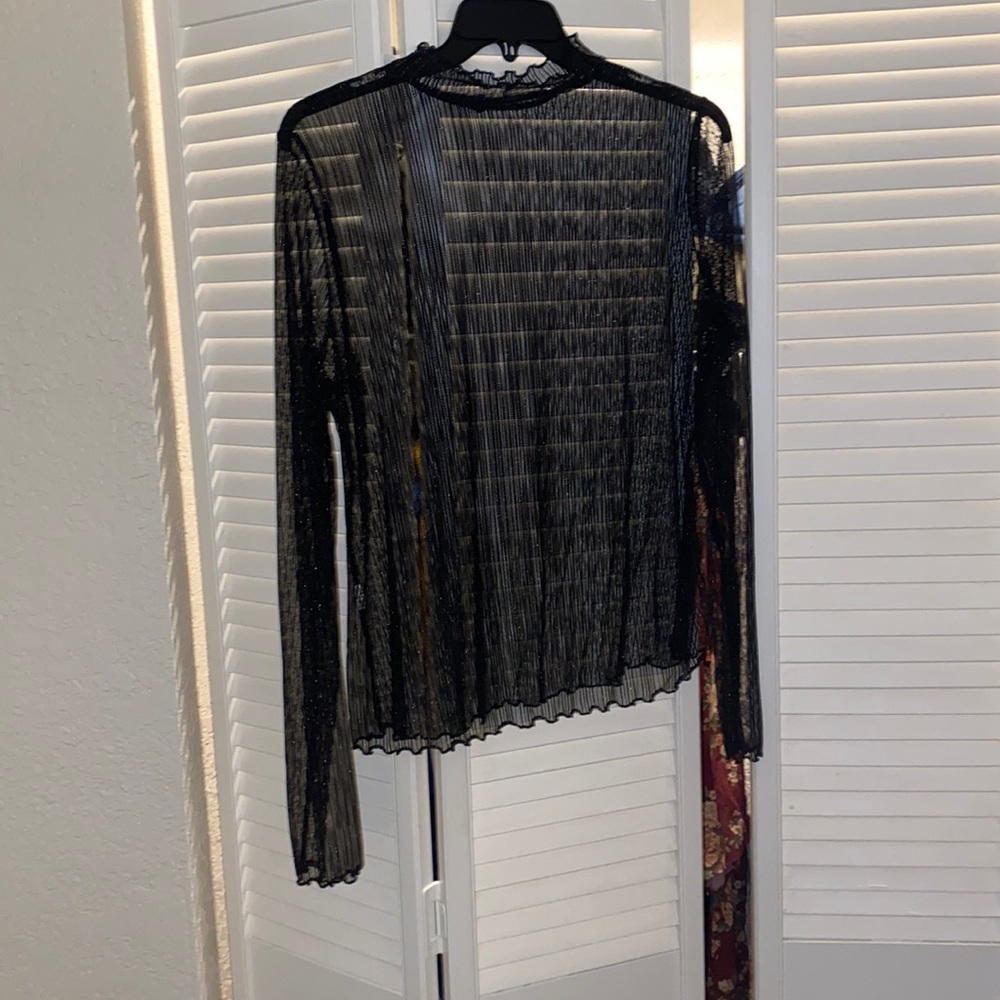 H&M sheer black in sparkle blouse.